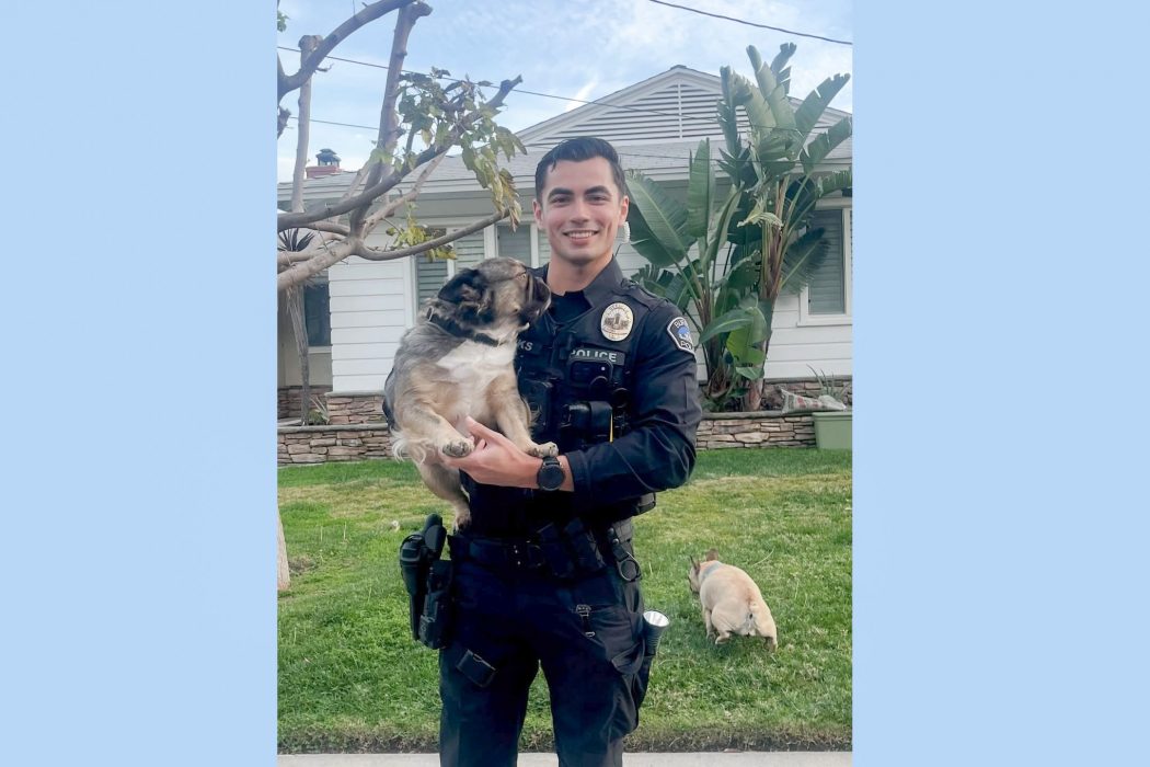 Hottie of the Day: Viral Photo of Sexy Cop with Dogs Sends the Internet Wild